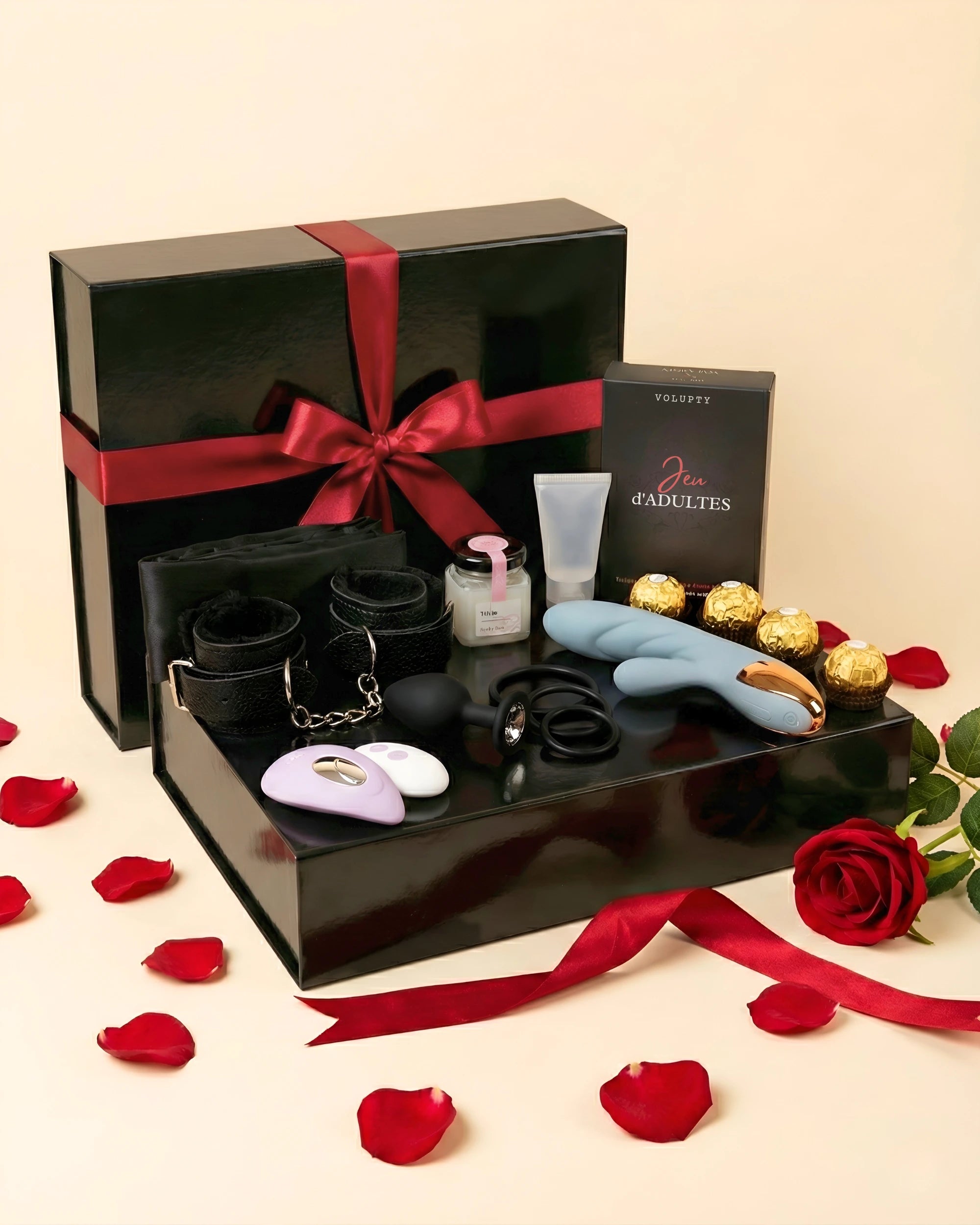 Vue d'ensemble du coffret cadeau pour couple avec sextoys et accessoires.