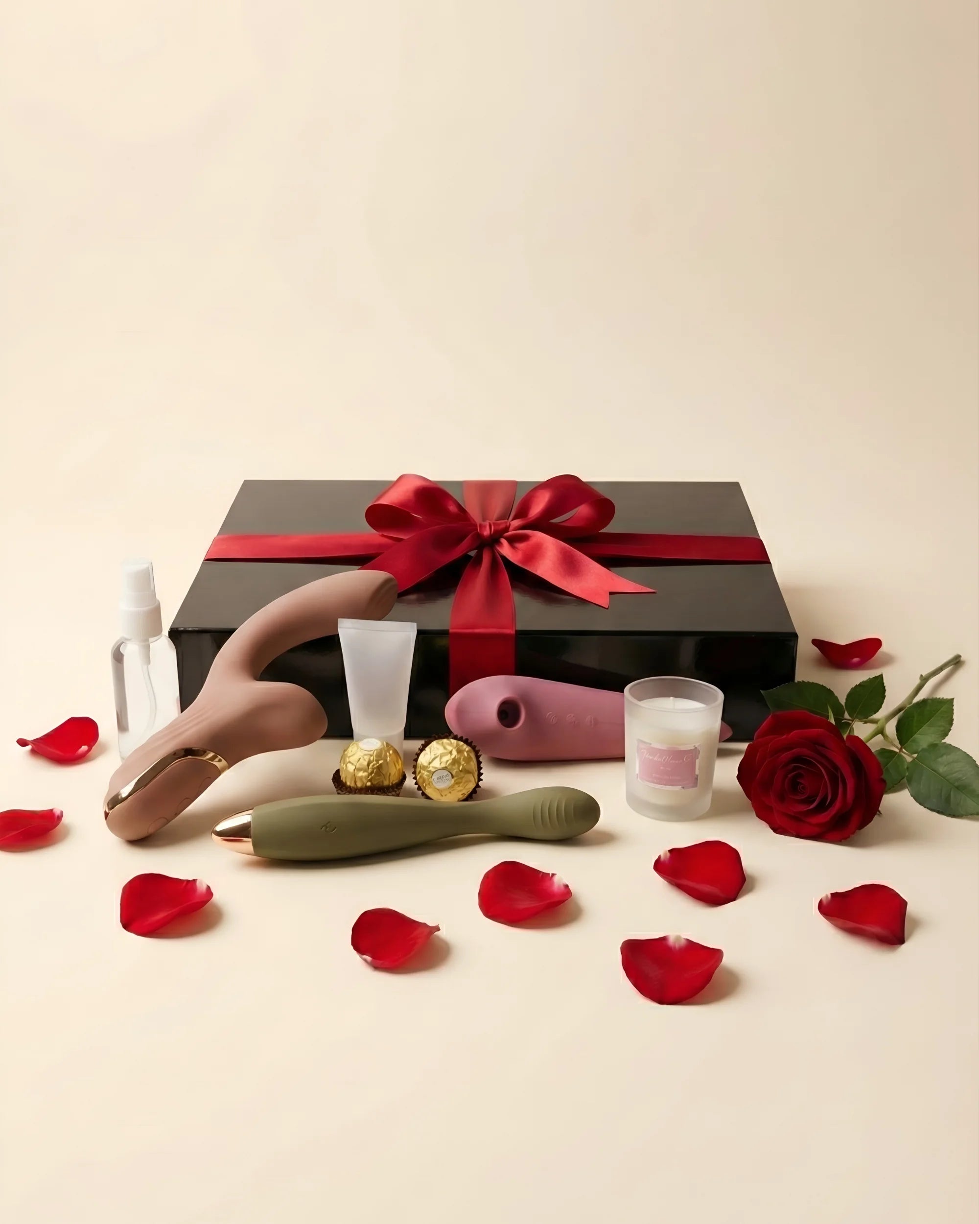 Idée cadeau Saint Valentin : coffret Nuit Magique noir avec ruban rouge, rose, chocolats et accessoires bien-être
